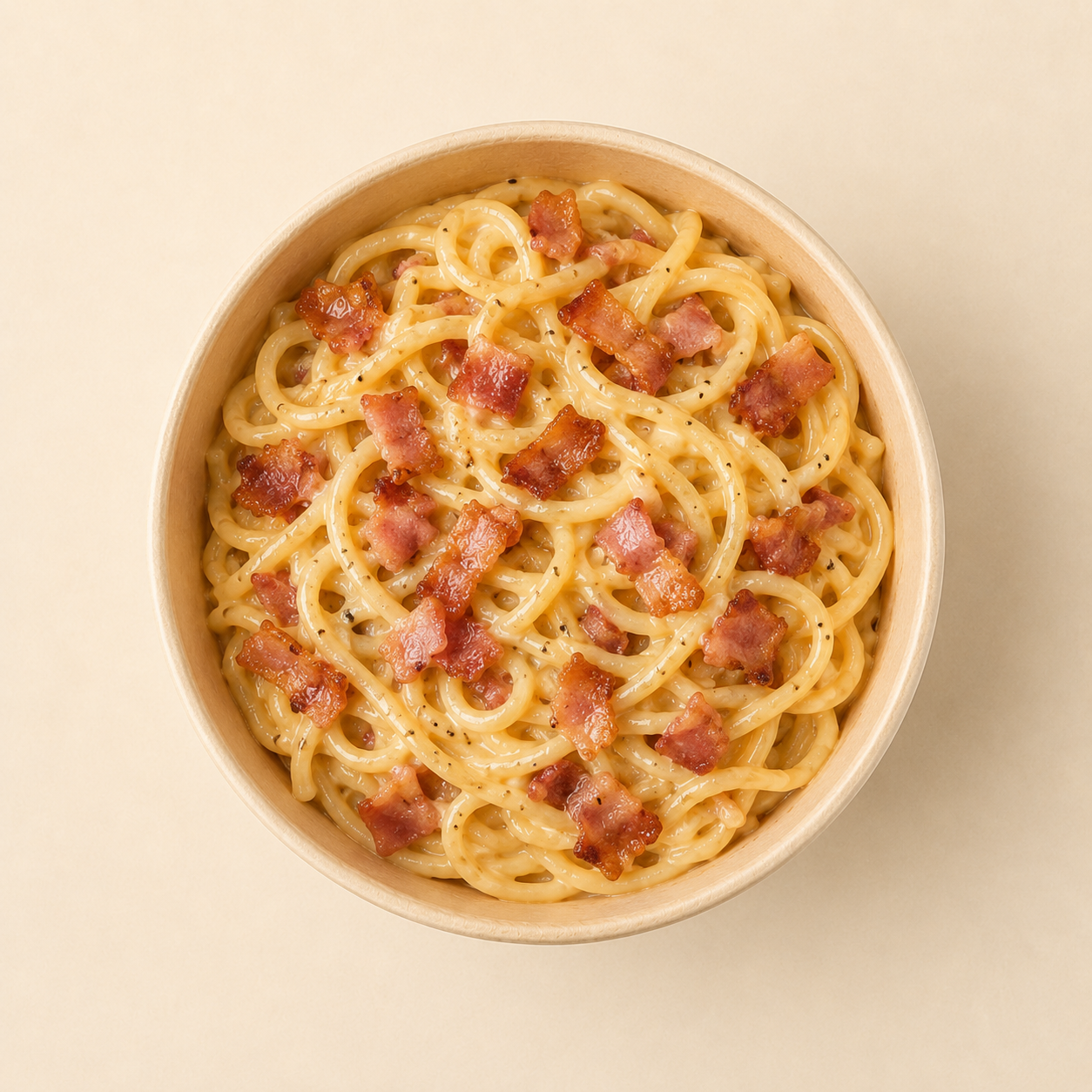 Carbonara de Sello de Casa en bowl kraft, vista cenital